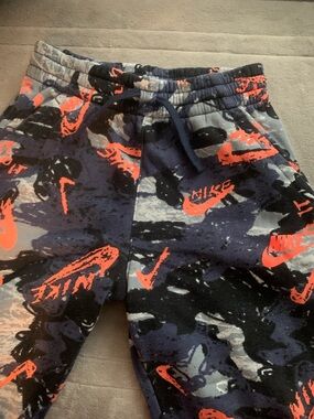 Nike Boys' Navy Camo Joggers with Bright Orange Logos